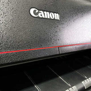 Close up of a Canon printer getting ready to print